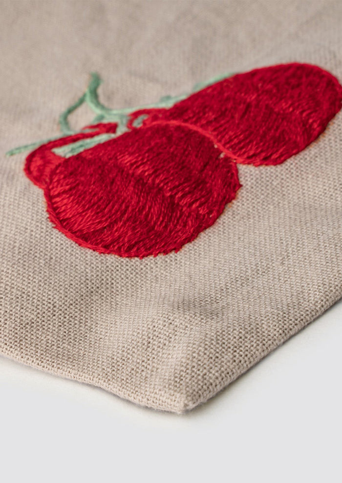 Tomato embroidery detailing.