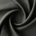 Close-up of Urban Moss deep grey-olive 100% linen fabric, 230 GSM, 25 LEA – close-up texture with a swirl pattern
