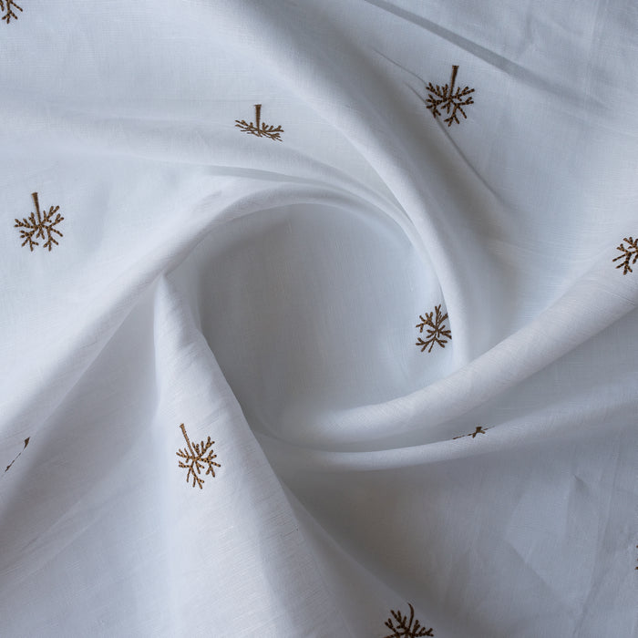 Wintertree Embroidery — pure white linen–cotton fabric with dark golden embroidered tree motif, 44 LEA