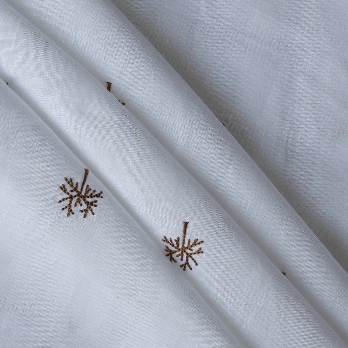 Wintertree Embroidery — pure white linen–cotton fabric with dark golden embroidered tree motif, 44 LEA