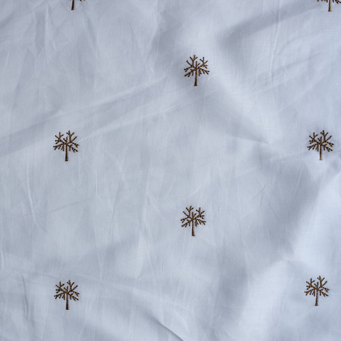 Wintertree Embroidery — pure white linen–cotton fabric with dark golden embroidered tree motif, 44 LEA