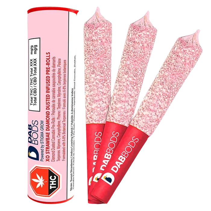 Three diamond-dusted pink pre-rolls fanned beside their pink tube packaging labeled XO Strawbae Diamond Dusted Infused PR 3 x 0.6 g